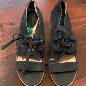 Frye Navy blue gladiator lace up sandal.